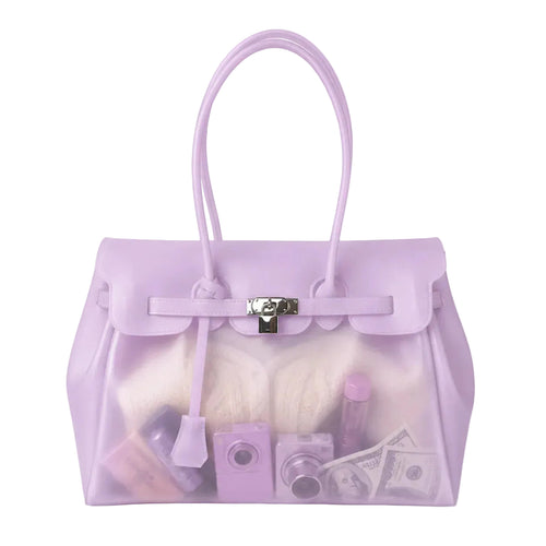 Purple transparent handbag with various items inside on a white background